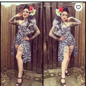 Violets in May zebra play suit.